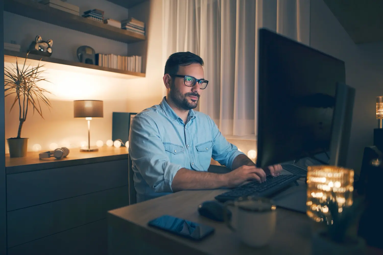 Man working as remote employee at computer